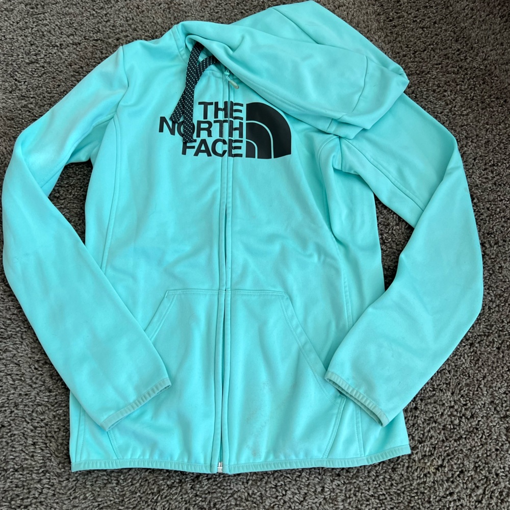 Teal North Face zip up jacket